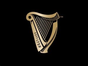 Vintage-Style Gold Harp Logo Design on Black